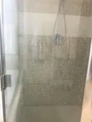 bathroom glass with water stains
