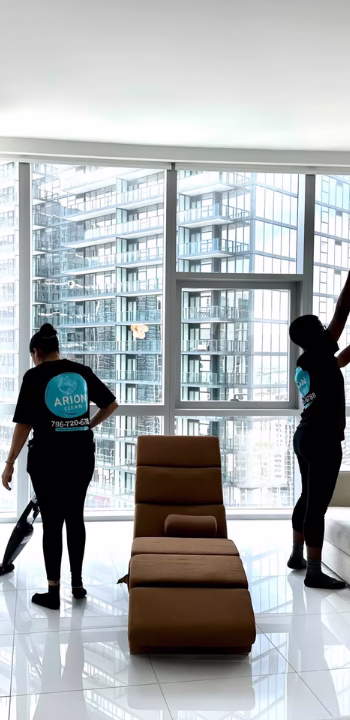 Miami house cleaner team performing eco-friendly cleaning in a modern Miami home interior